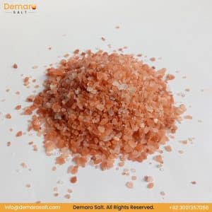 Pile of Himalayan Dark Pink Coarse Salt Crystals with Demaro Salt Logo