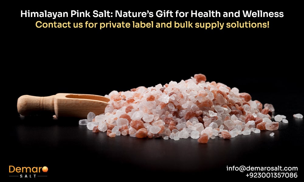Close-up of pink salt granules, showcasing their natural color and texture.