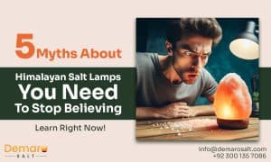 Person looking at a Himalayan pink salt lamp debunking myths.